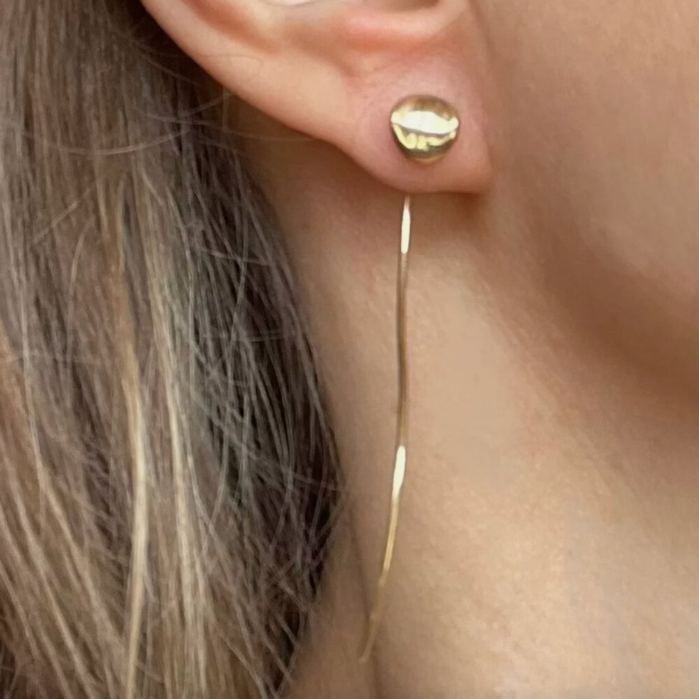Graceful 14K gold wavy wire earrings, from Saks Fifth Avenue.